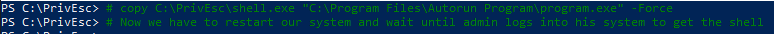 PowerShell comment noting that the system needs to be restarted and an admin needs to log in for the AutoRun payload to trigger